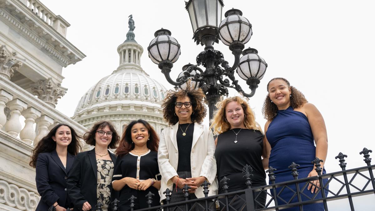 Congresswoman Kamlager-Dove alongside interns outside of the Capitol.